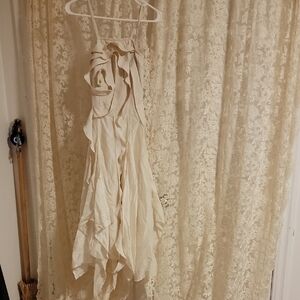 Elegant Cream Dress with Ruffle Details